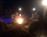 john jordan - with family around pool and firepit